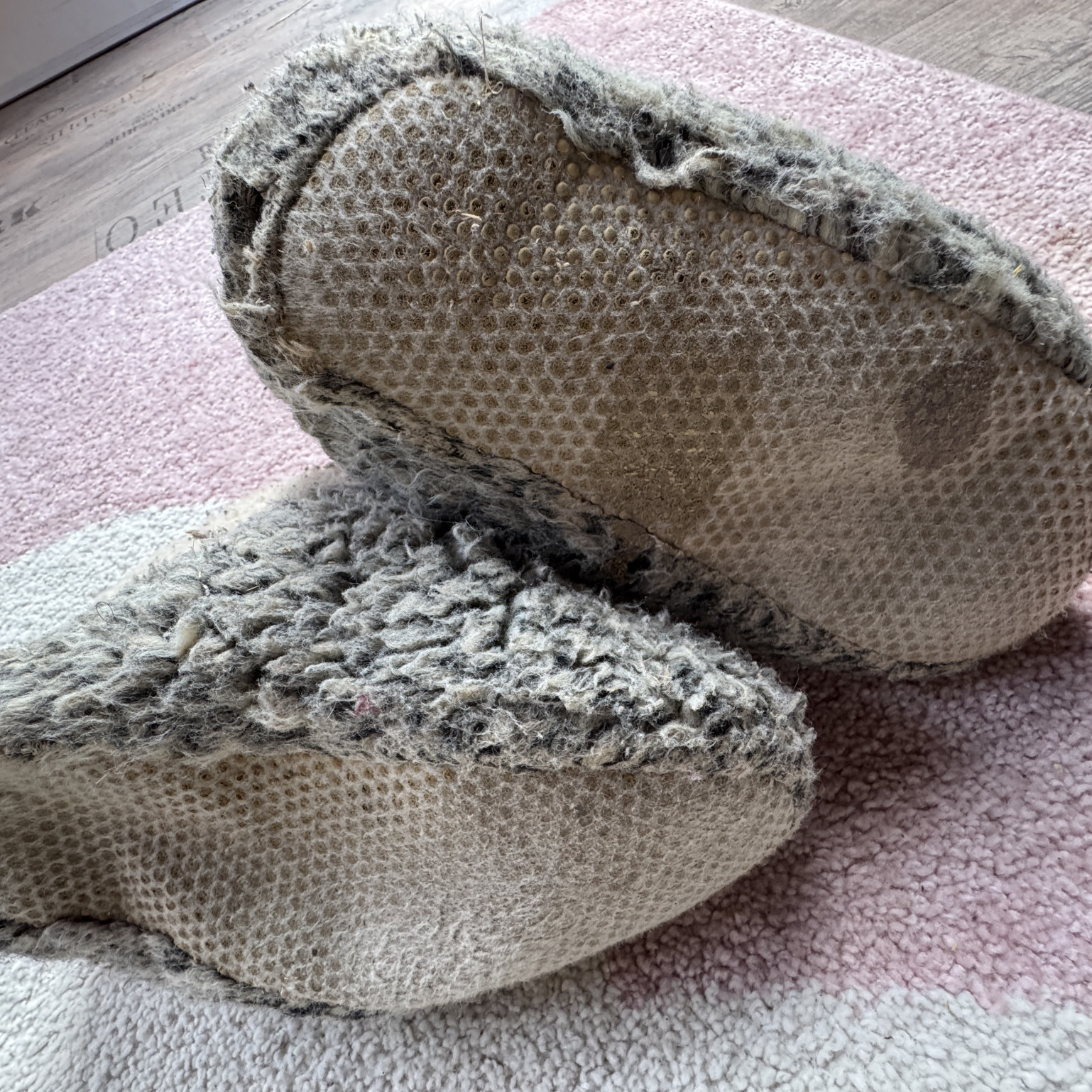 used and worn Lambskin shoes slippers