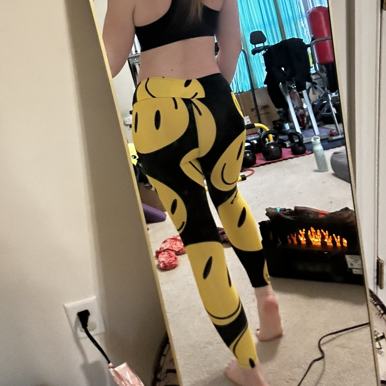 Smiley yoga pants worn