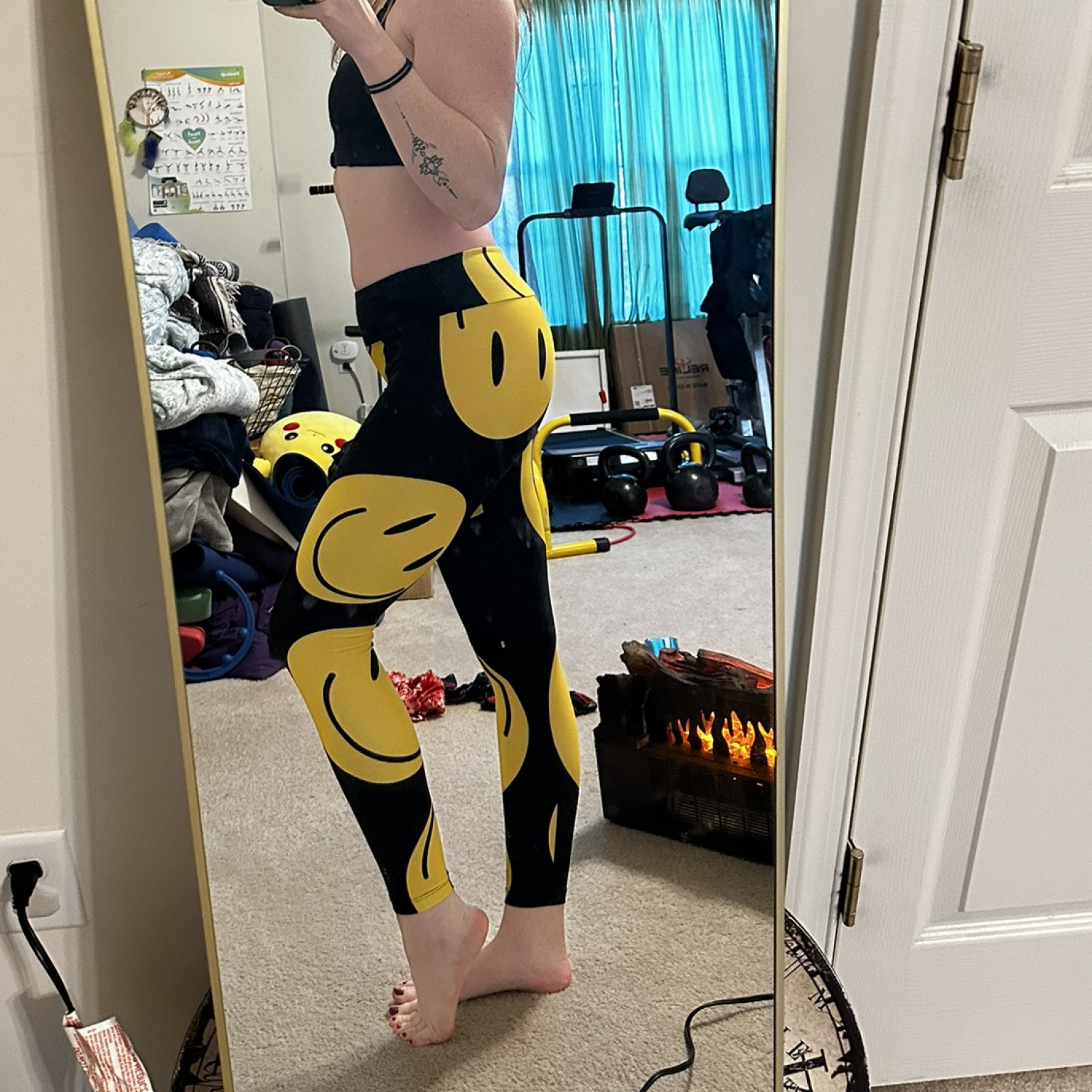 Smiley yoga pants worn
