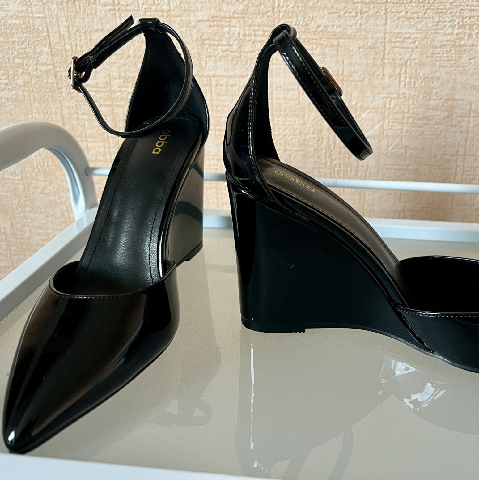 Black patent leather shoes with ankle strap