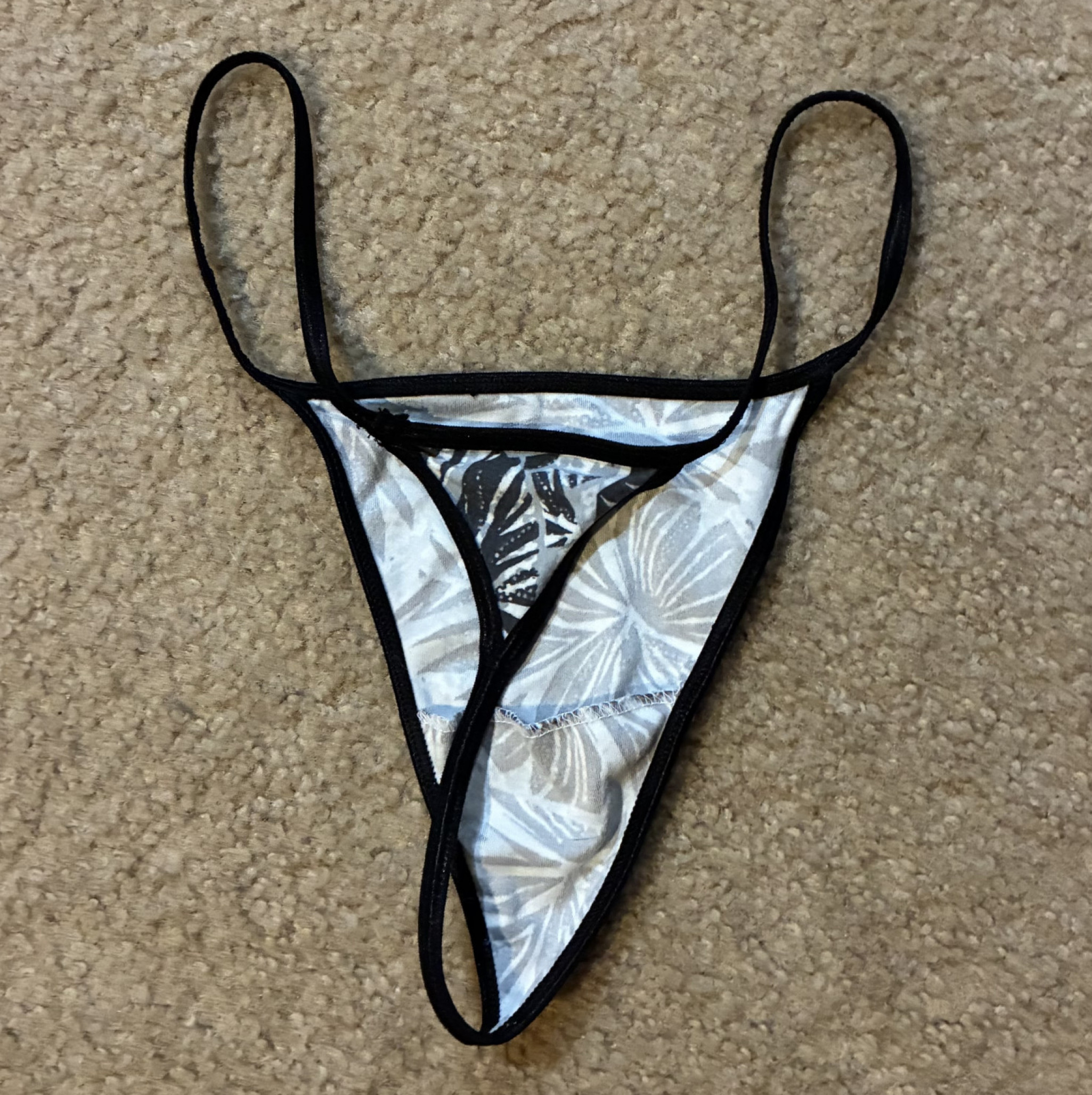 Used black and white flower g string