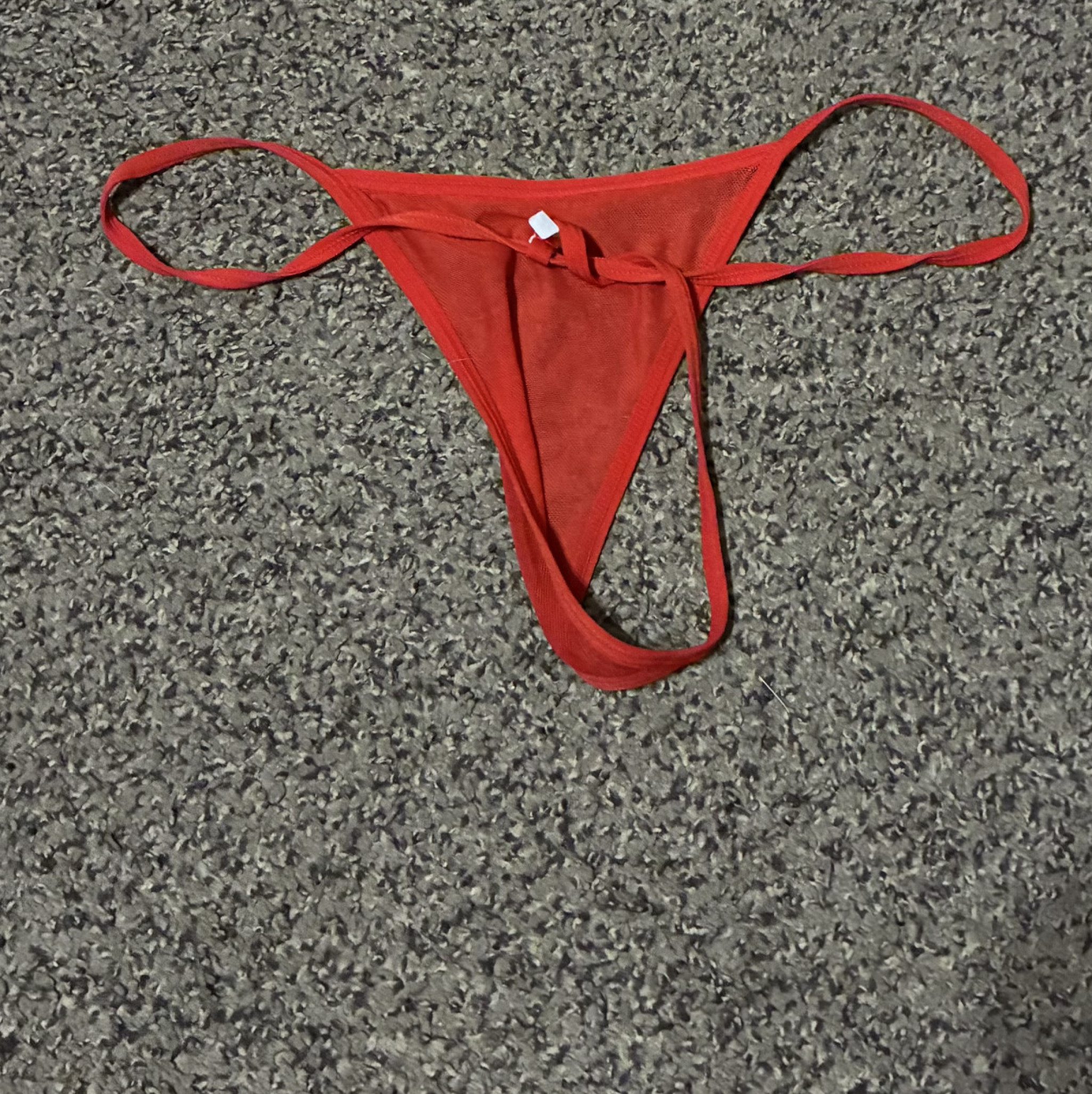 Used red g string