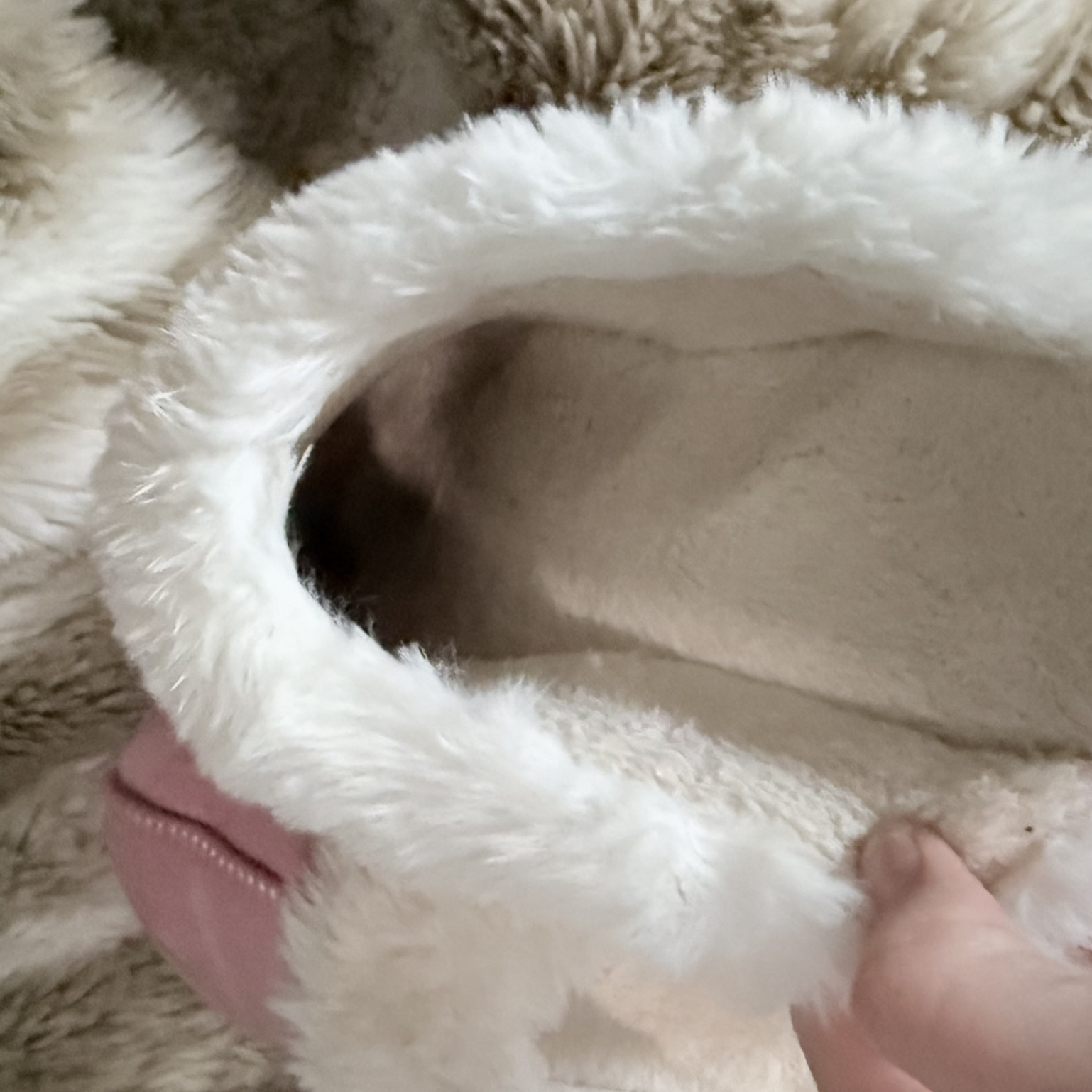 Worn pink fluffy slippers