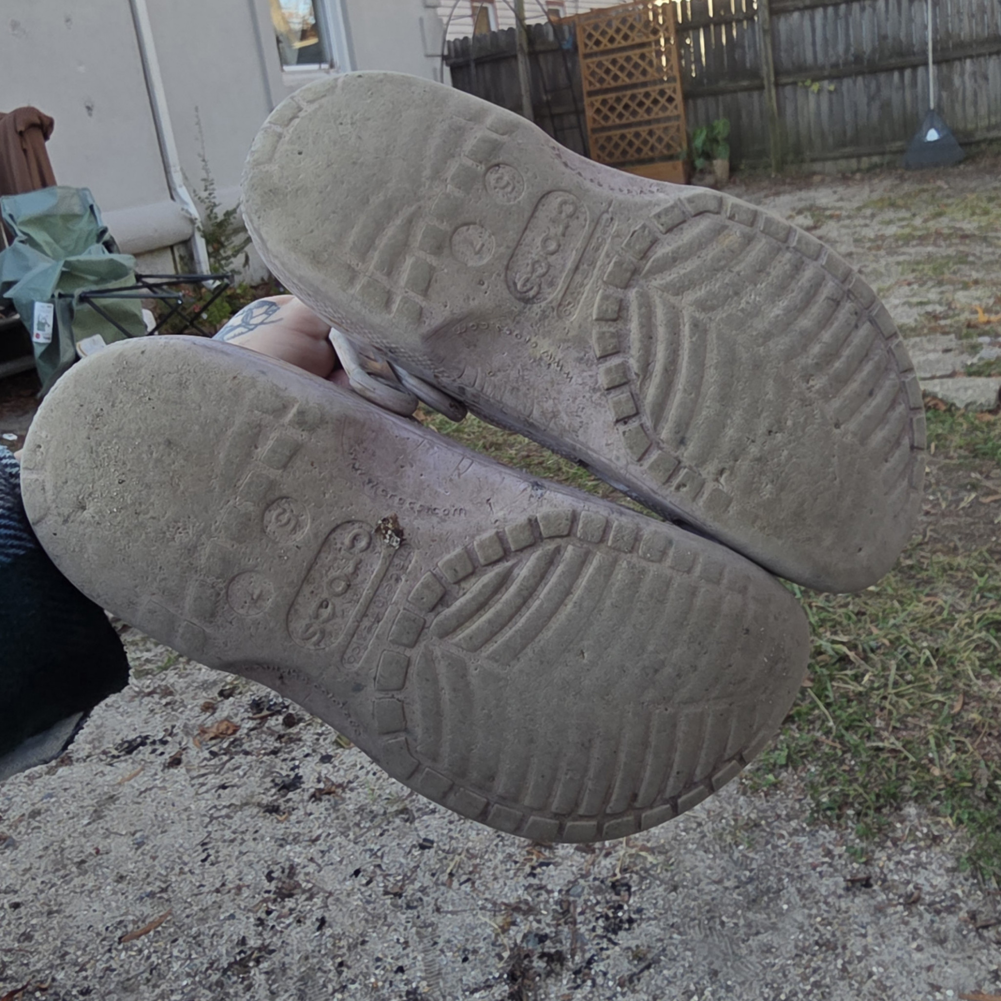 Worn Purple Crocs with Charms