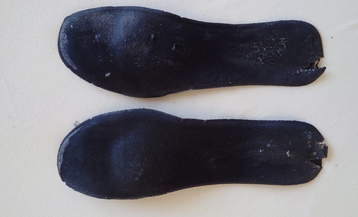 Worn insoles of work shoes