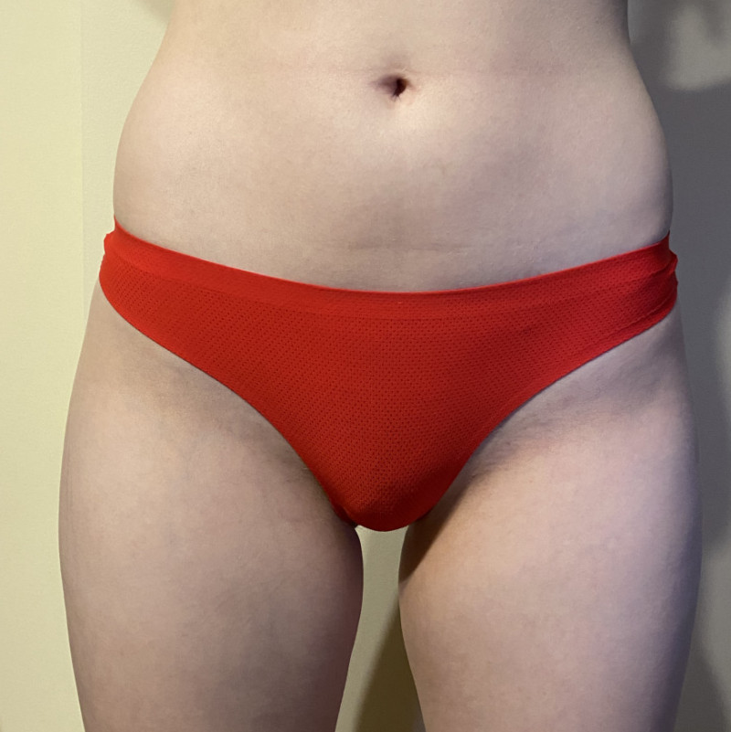 Red seamless thong with cum