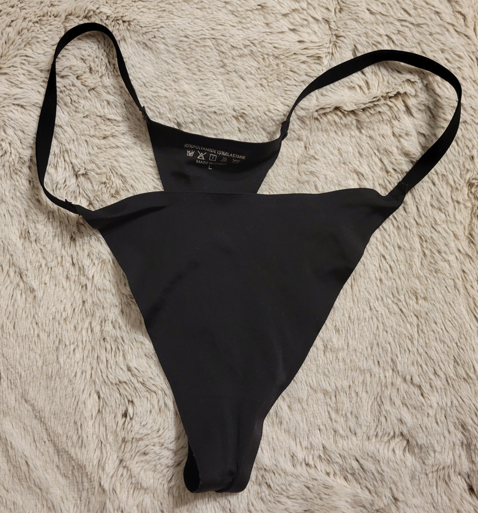 Black thong Polaroids Included