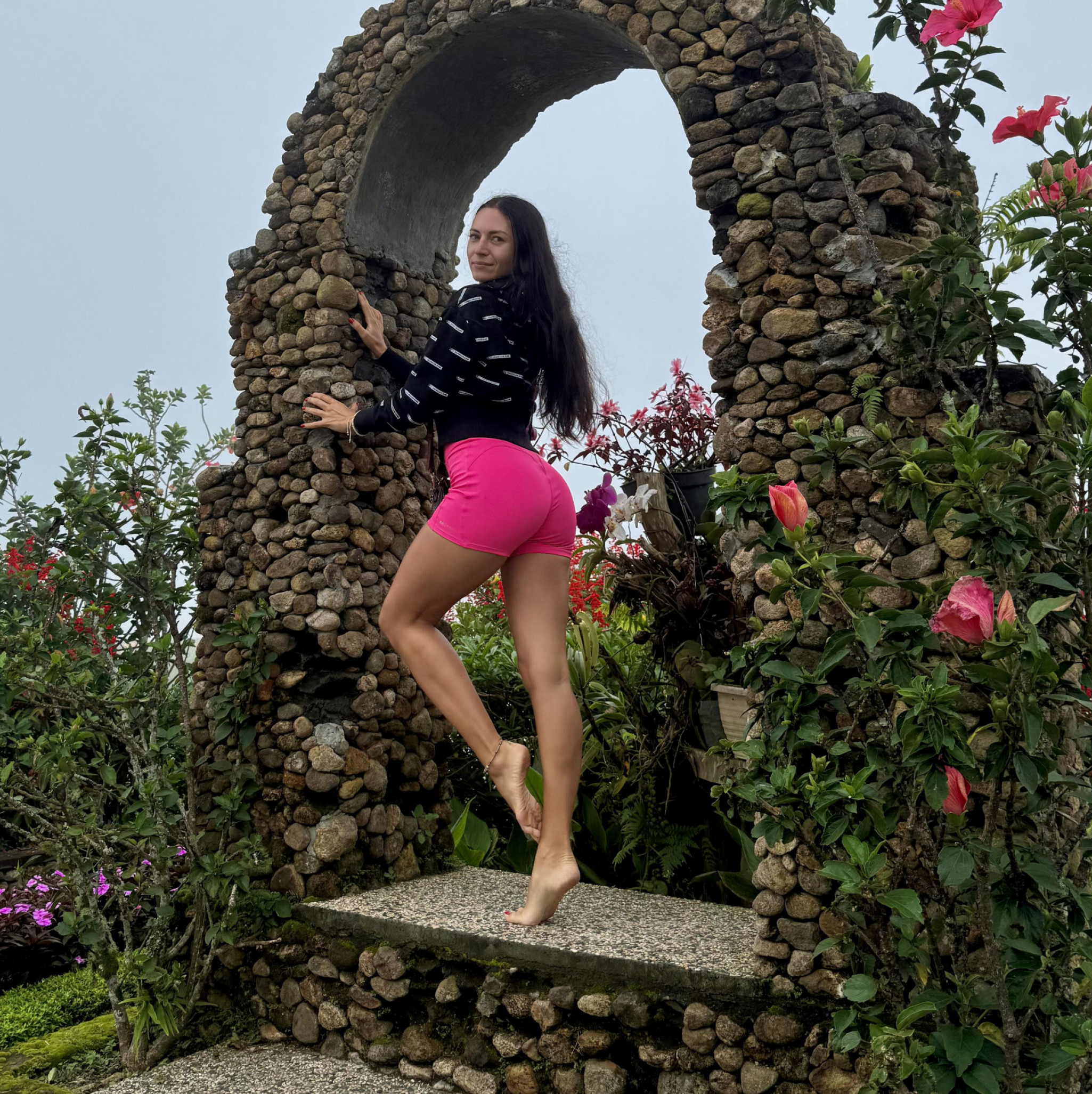 Hot Brunette in Pink Dress Outdoors