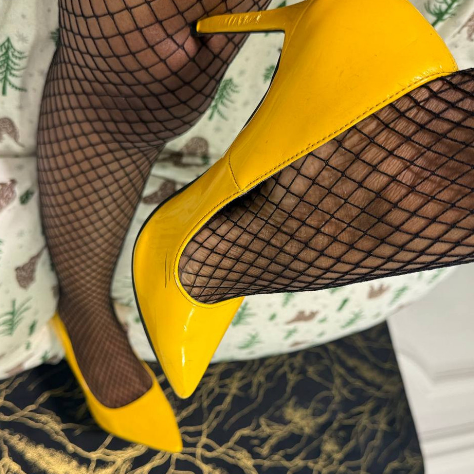 Stockings and sunshine heels tease