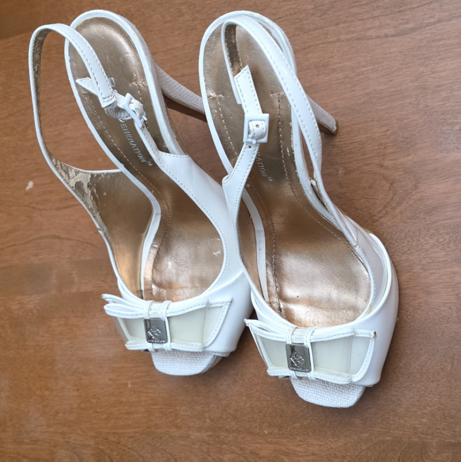 Worn White Heels