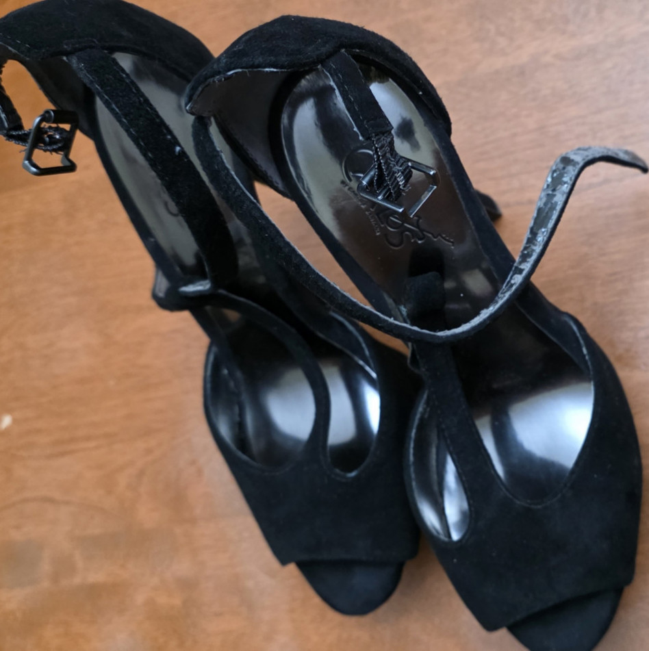 My Favorite  Pair Of Worn Black Heels