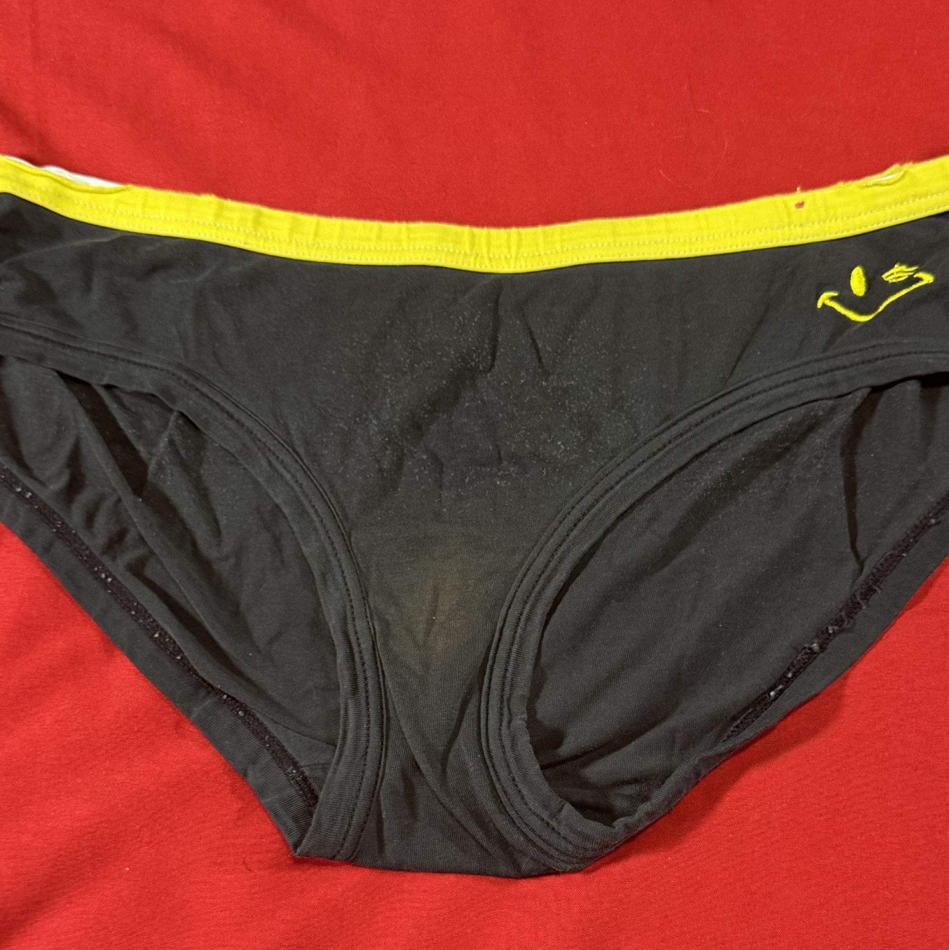 Black and yellow slightly damaged panties