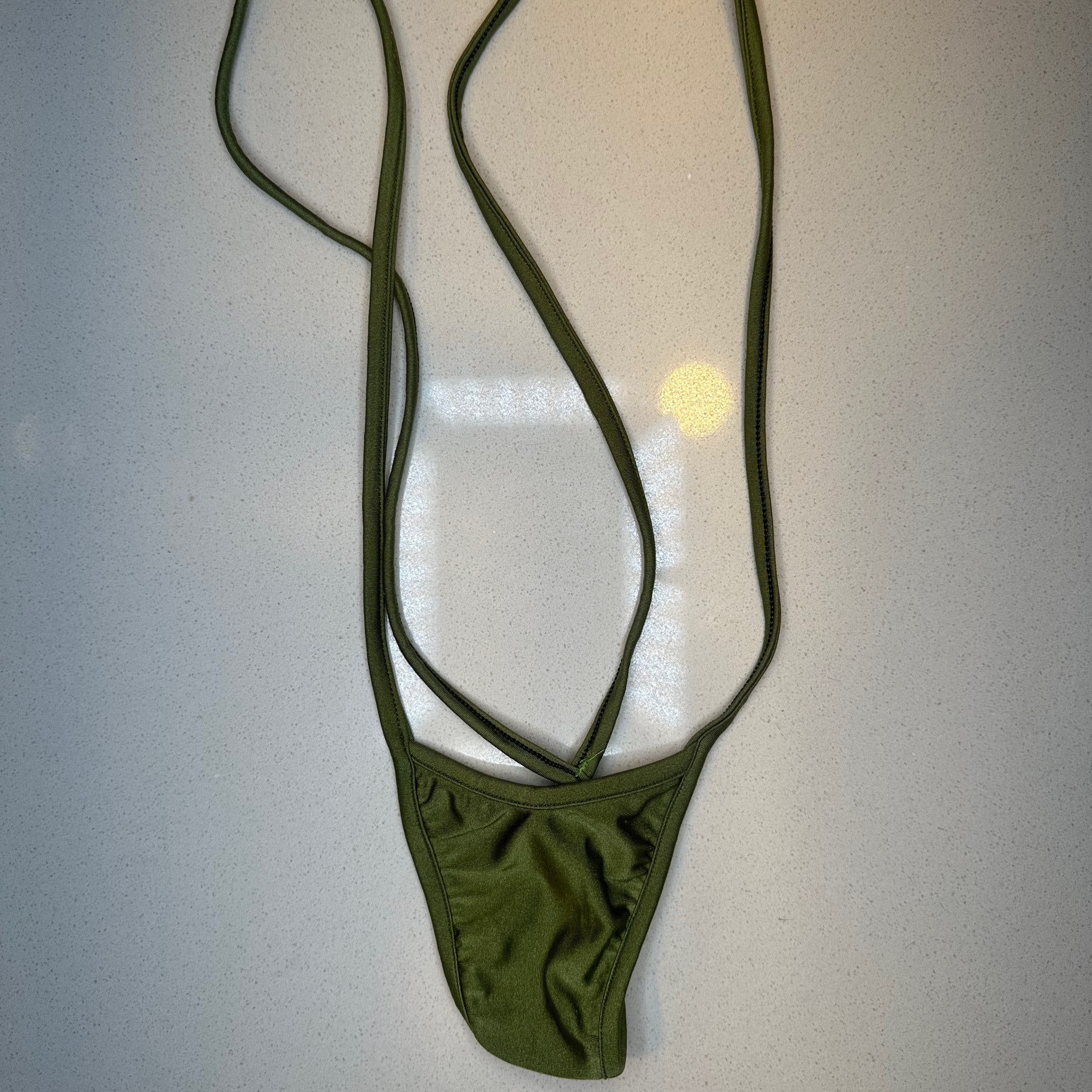 Green slingshot thong