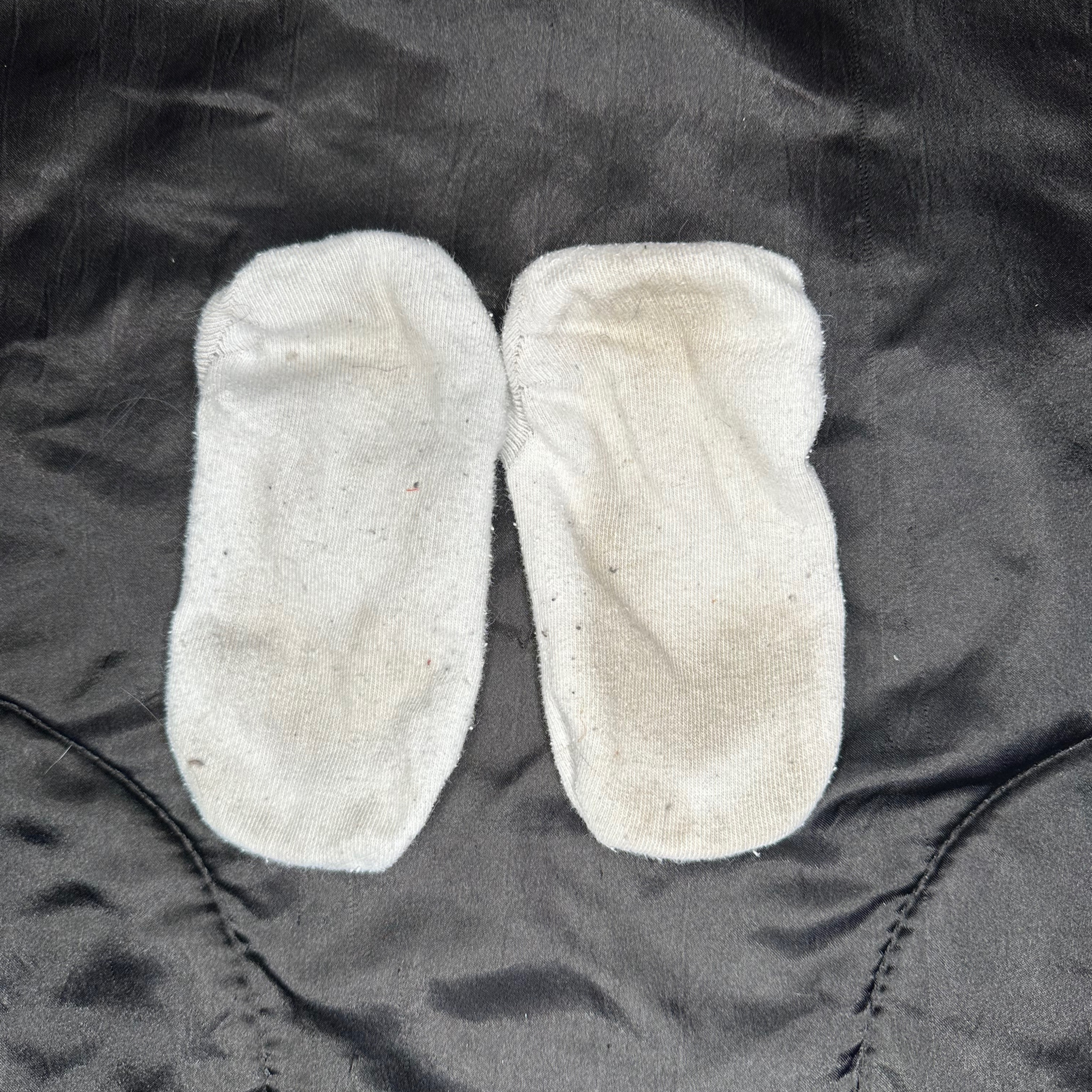 Very used white socks