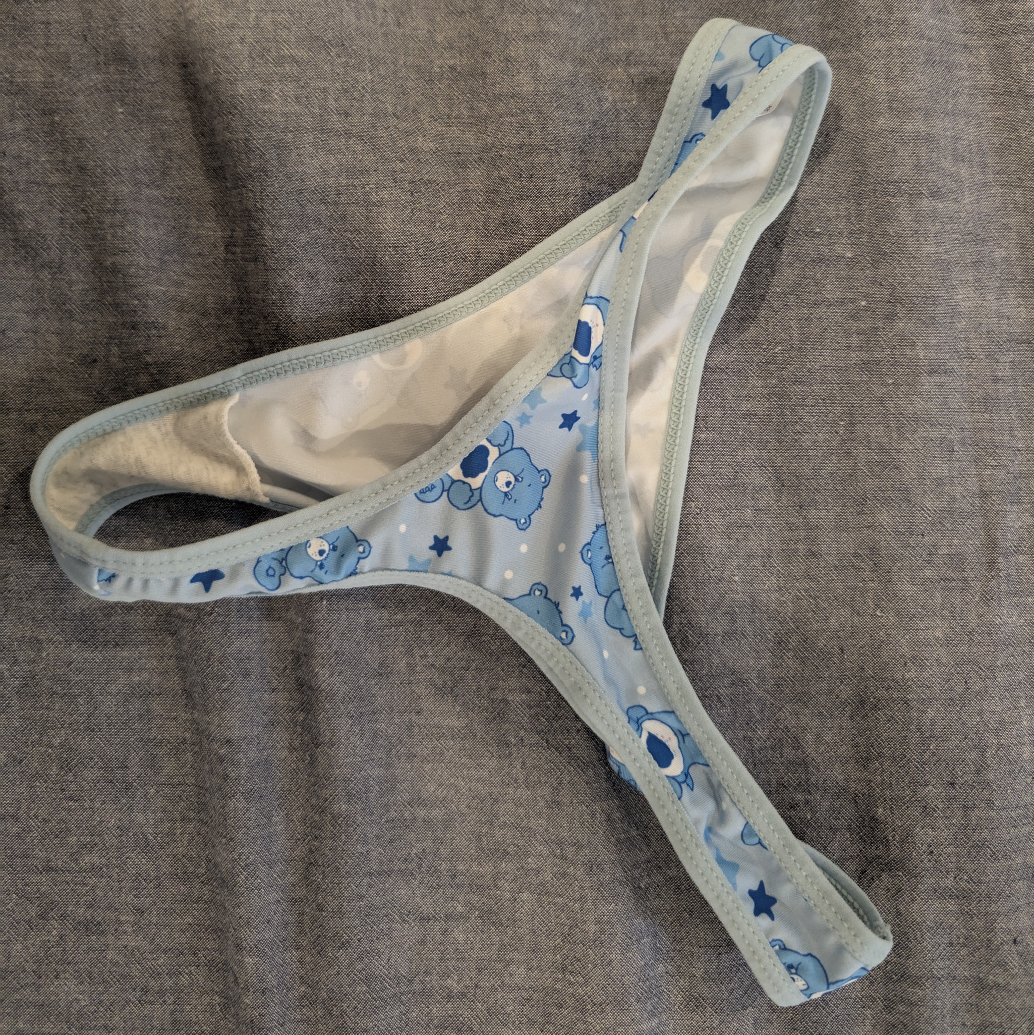 Worn light blue thong