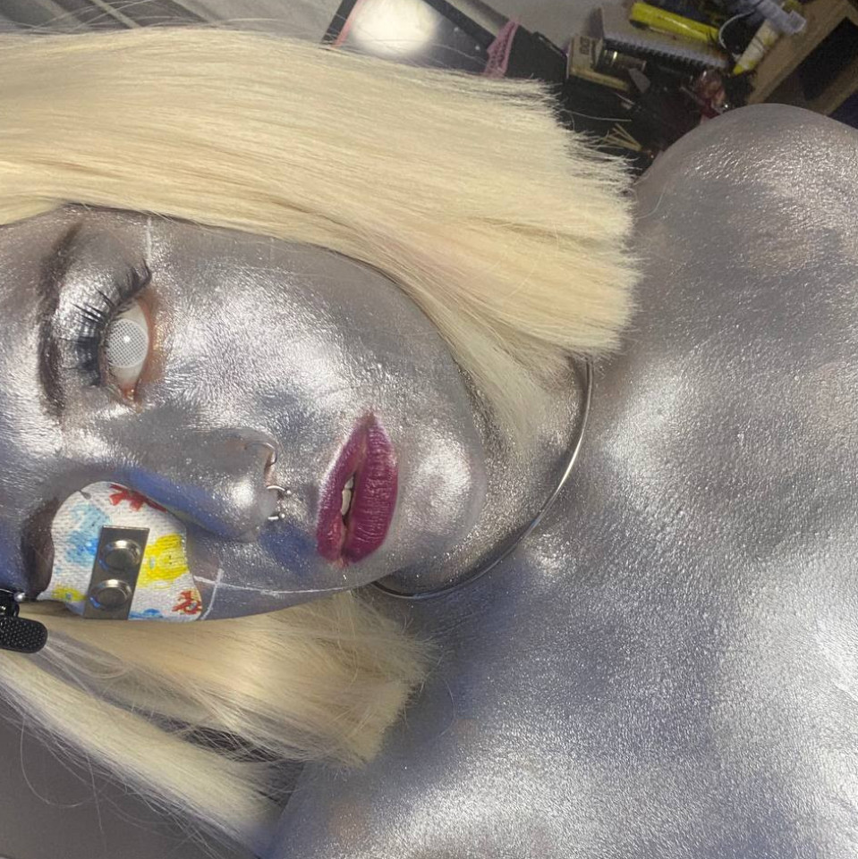 video with the body completely covered in makeup