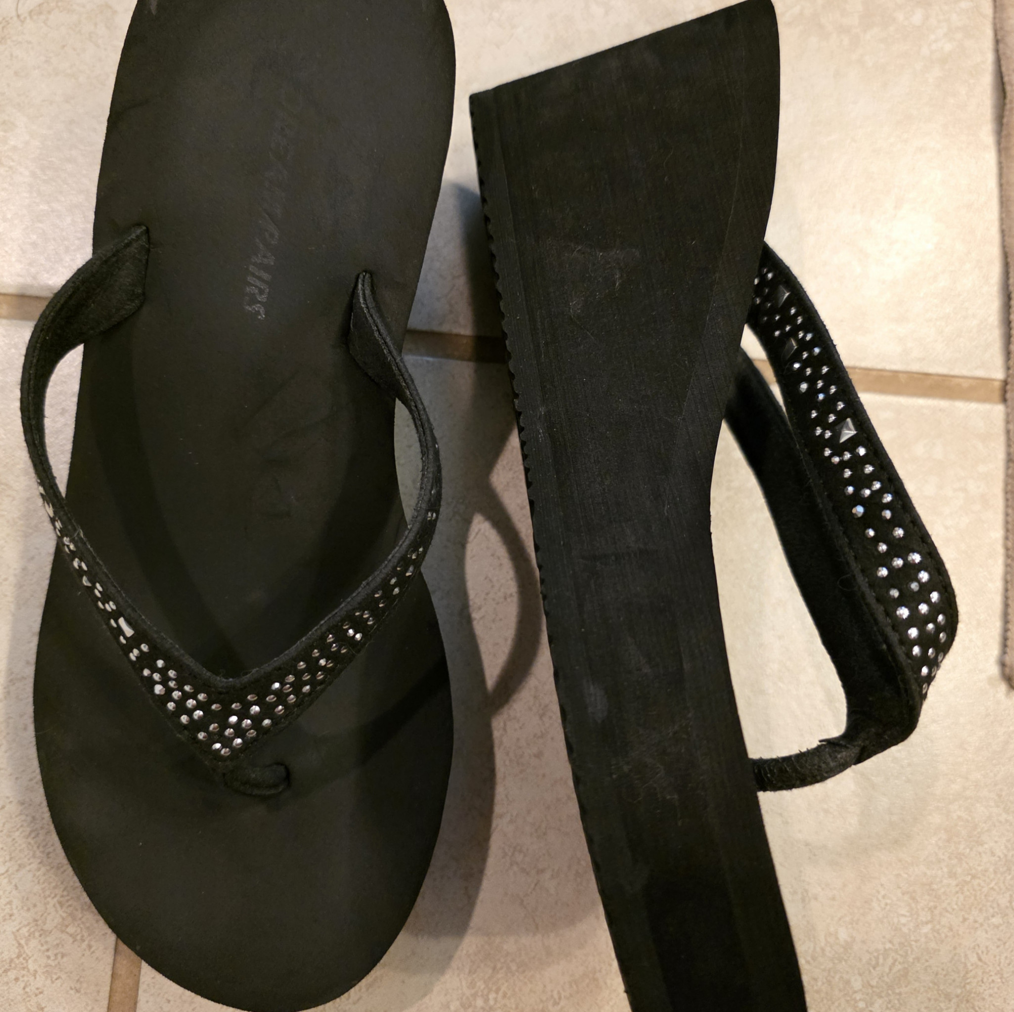 Worn platforms flip flops