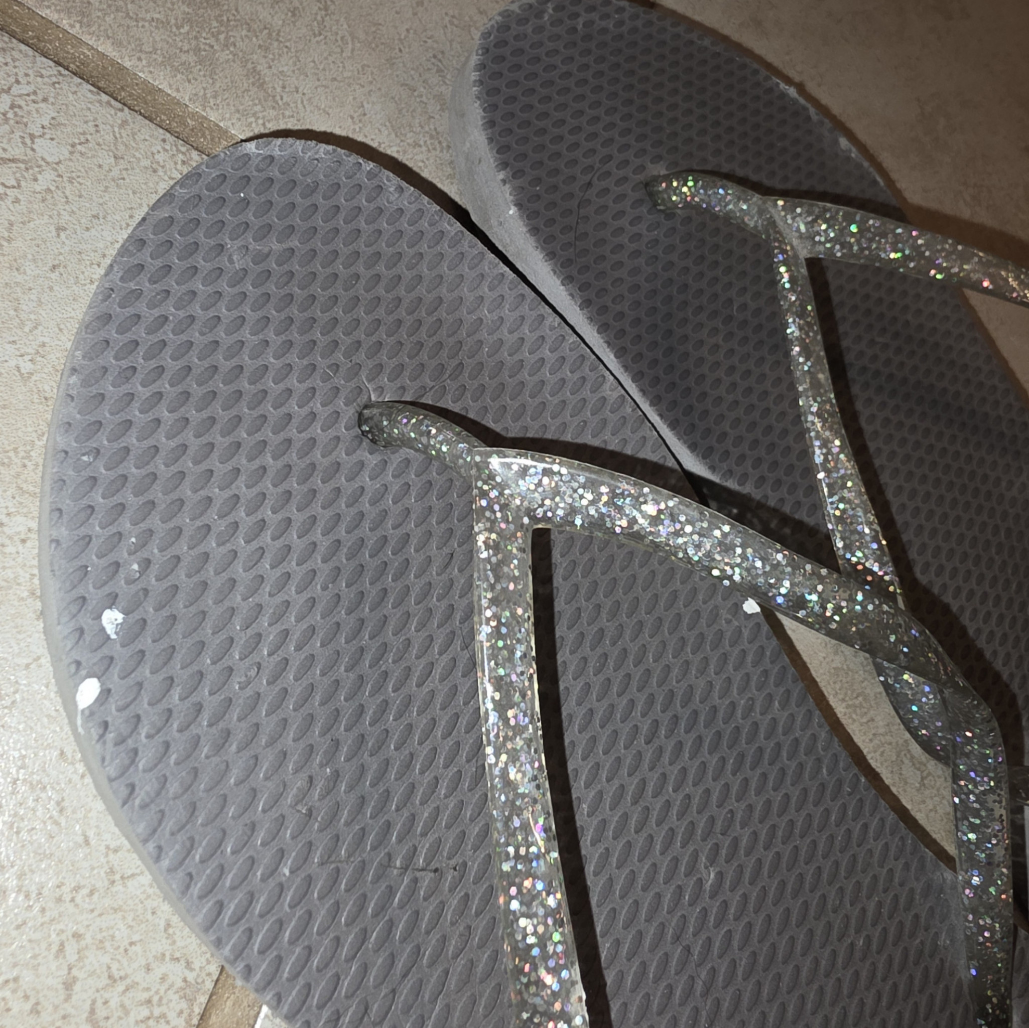 Worn old navy flip flops