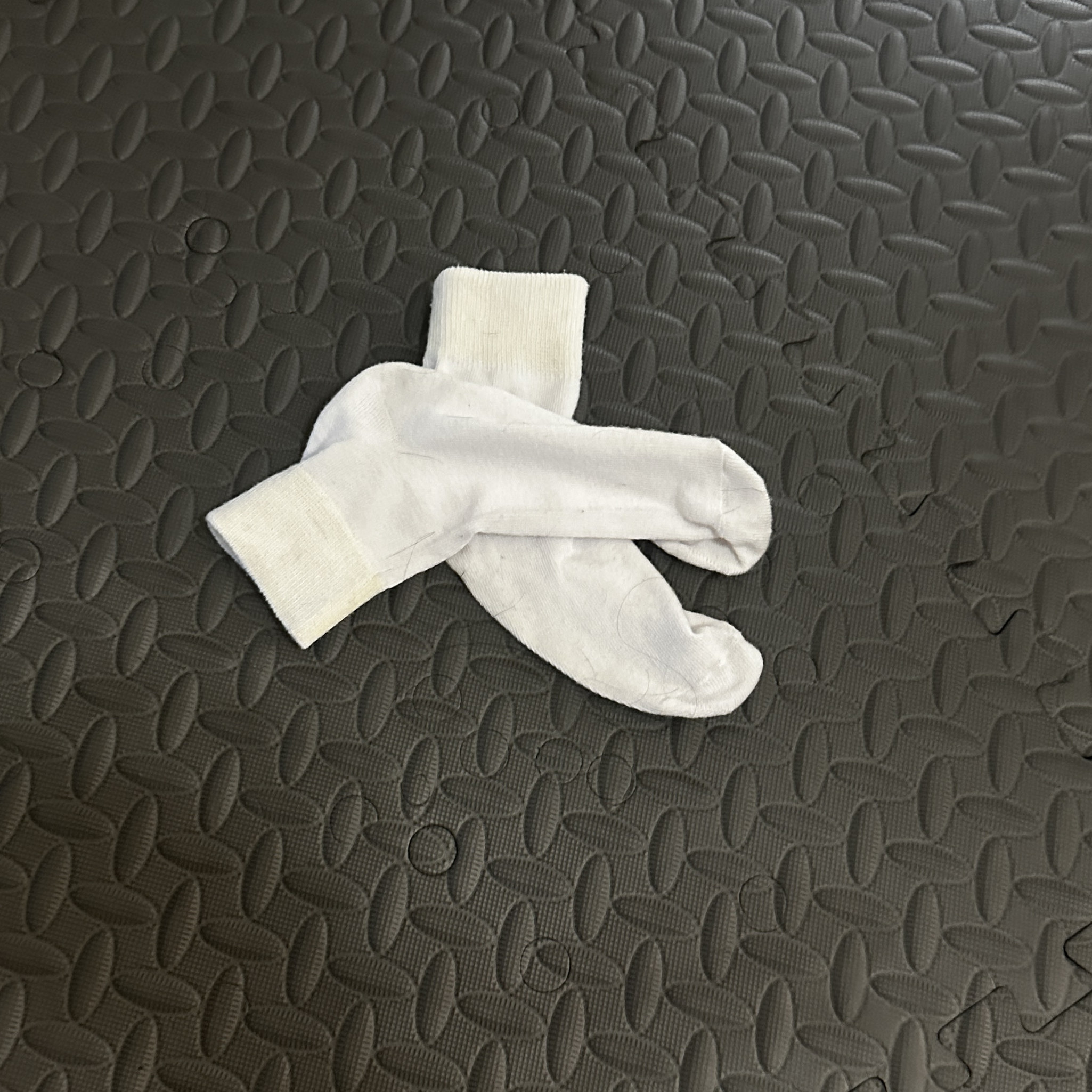 White Ankle Socks Worn and Waiting to be Claimed