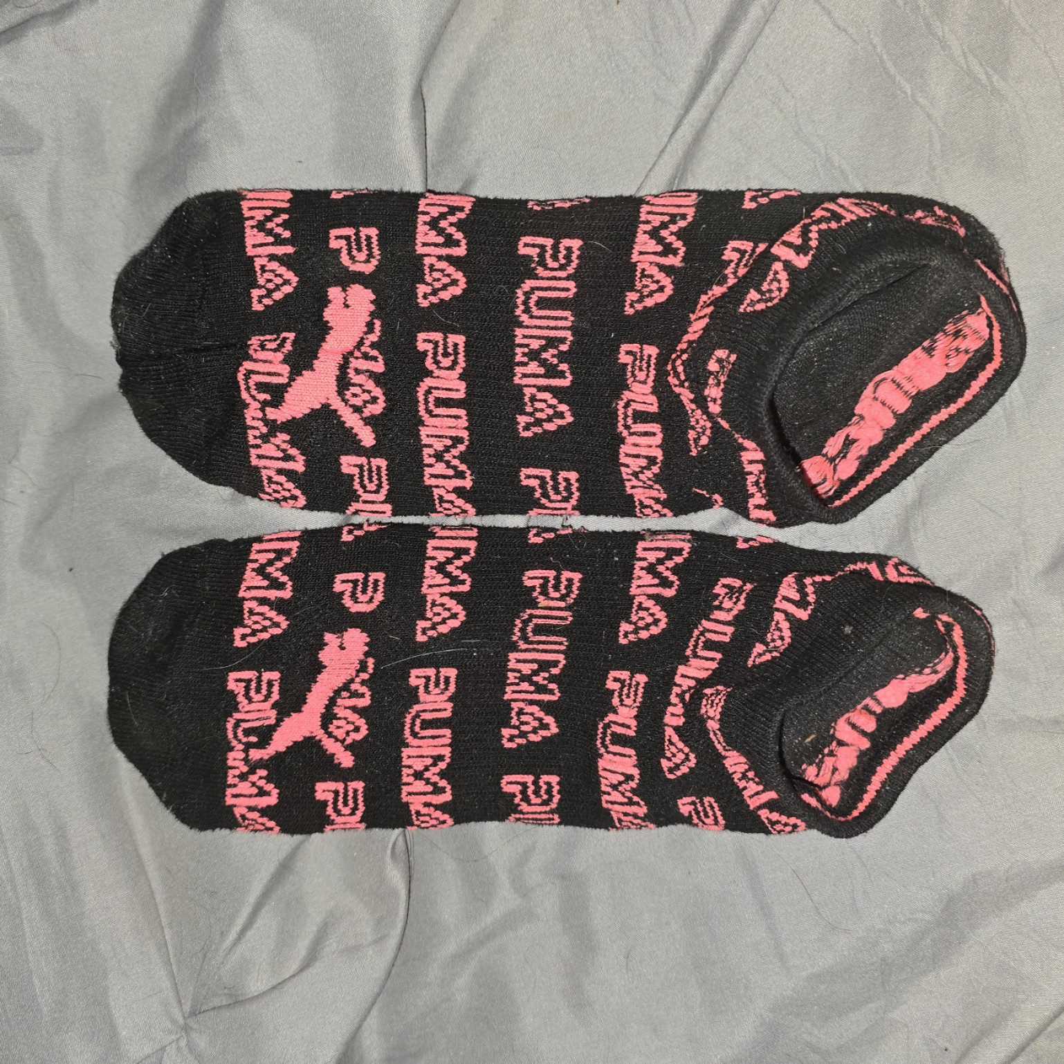 Sweaty black with pink puma socks