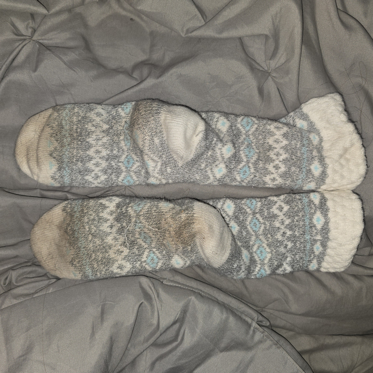 Well worn house slipper socks