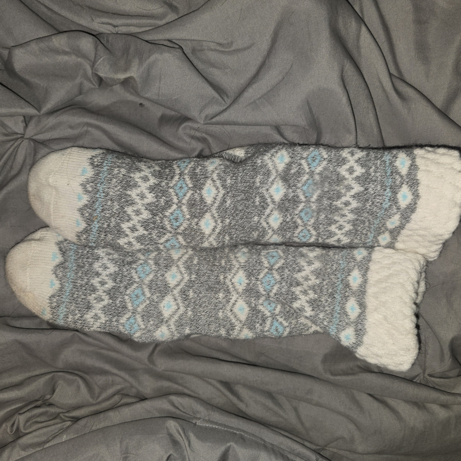 Well worn house slipper socks