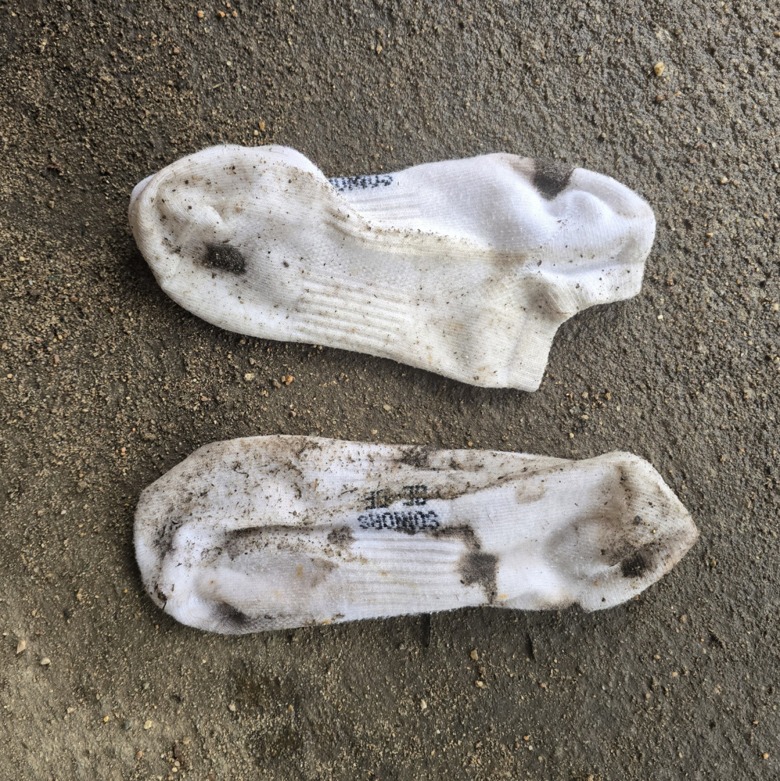 Destroyed muddy shox and socks