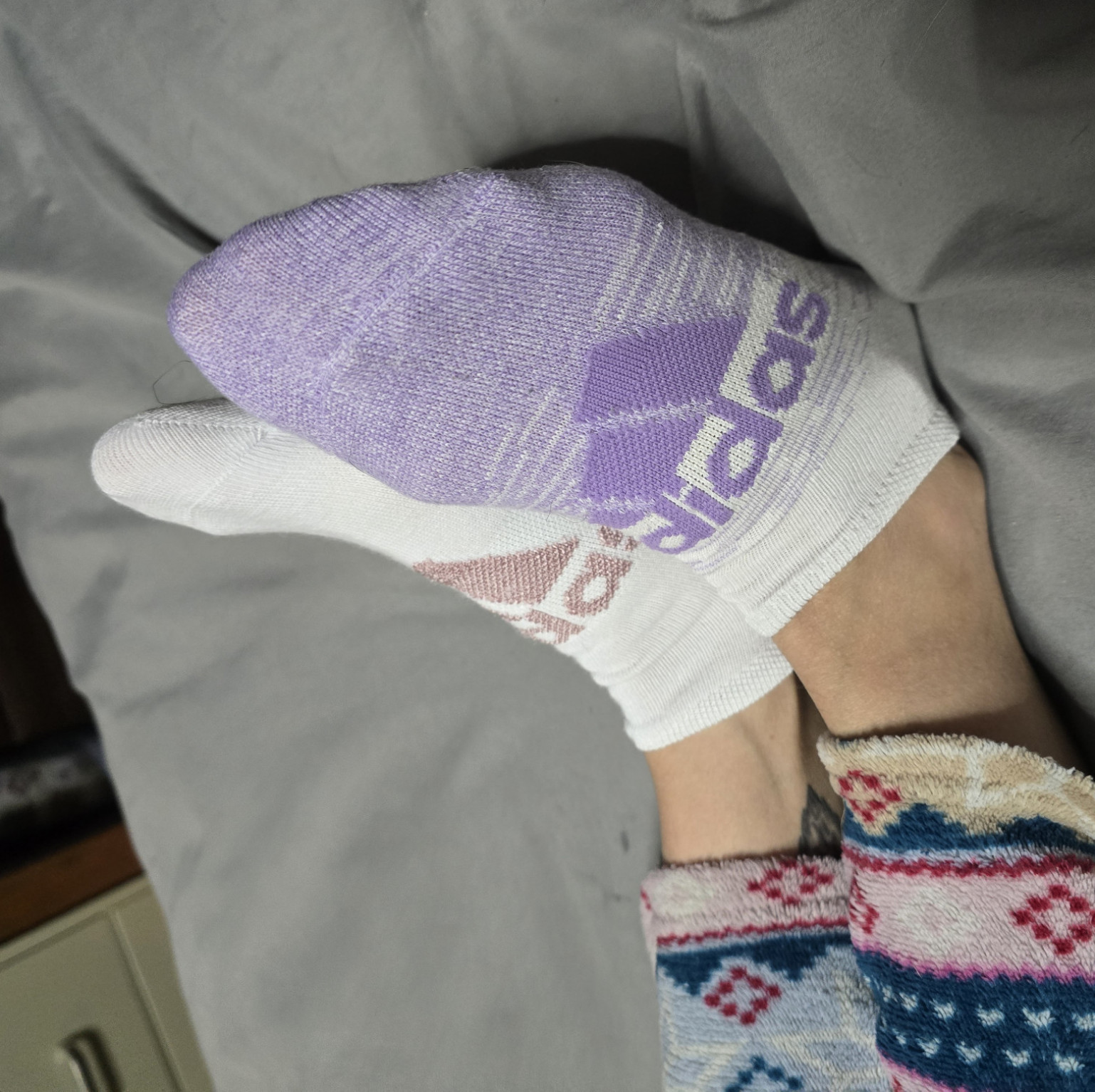 Mismatched adidas socks