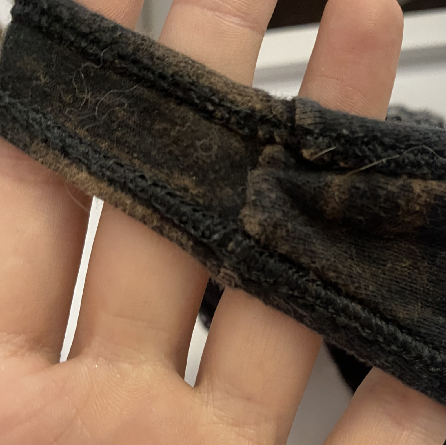 Worn black thong