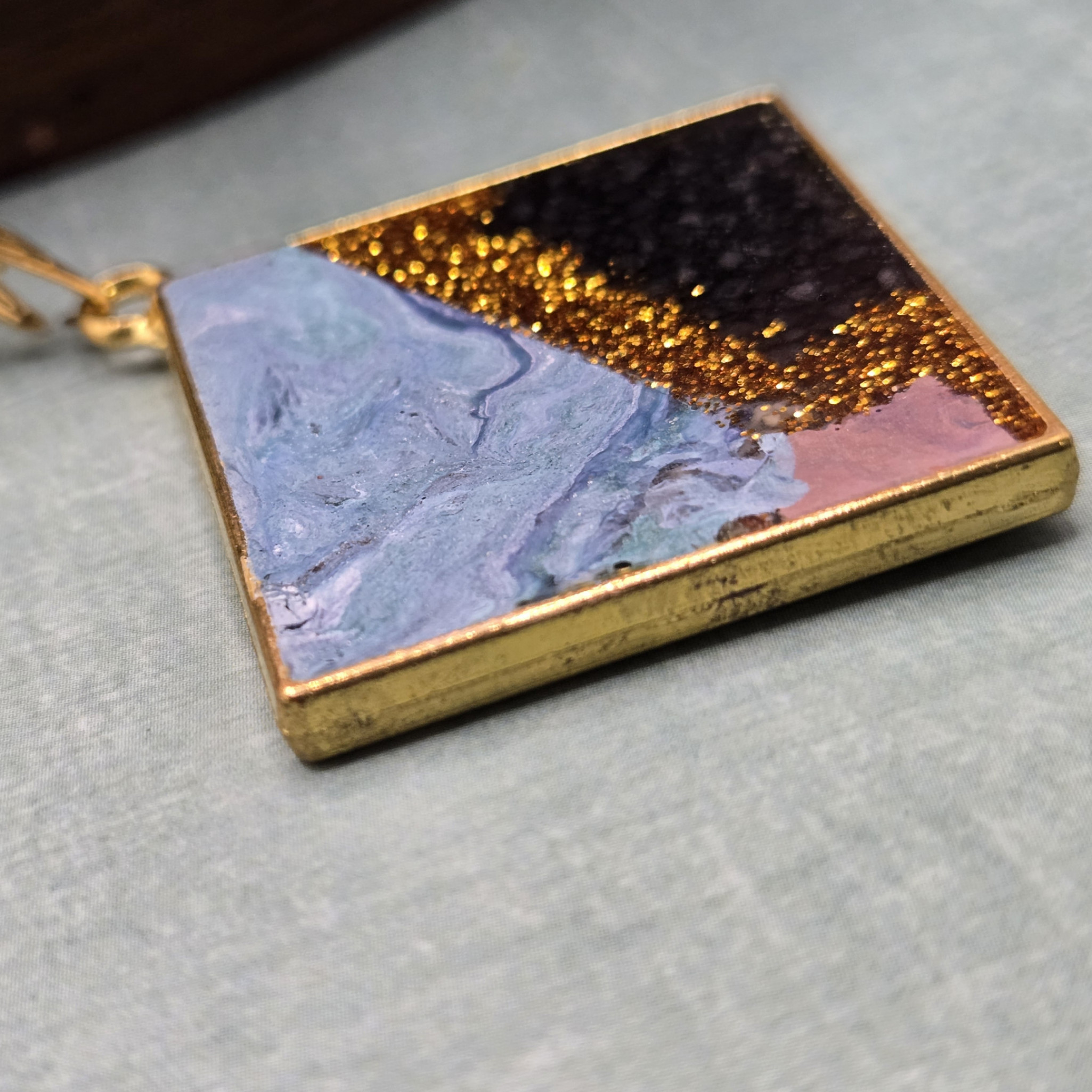 Large diamond shape geometric pendant