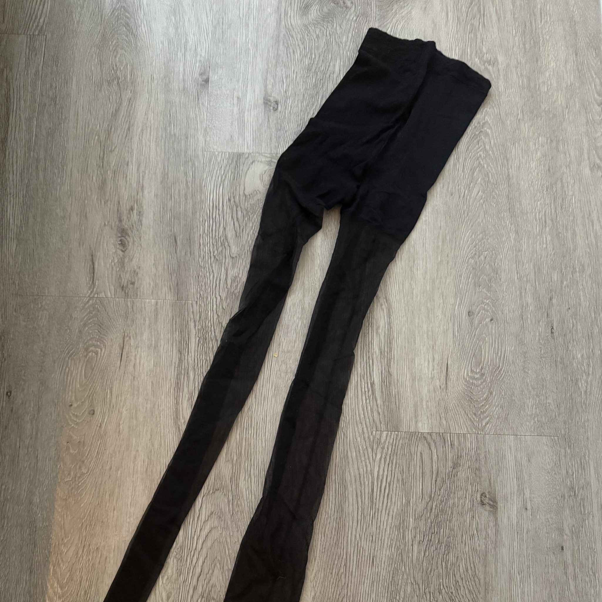 WORN TIGHTS WITH SEAM