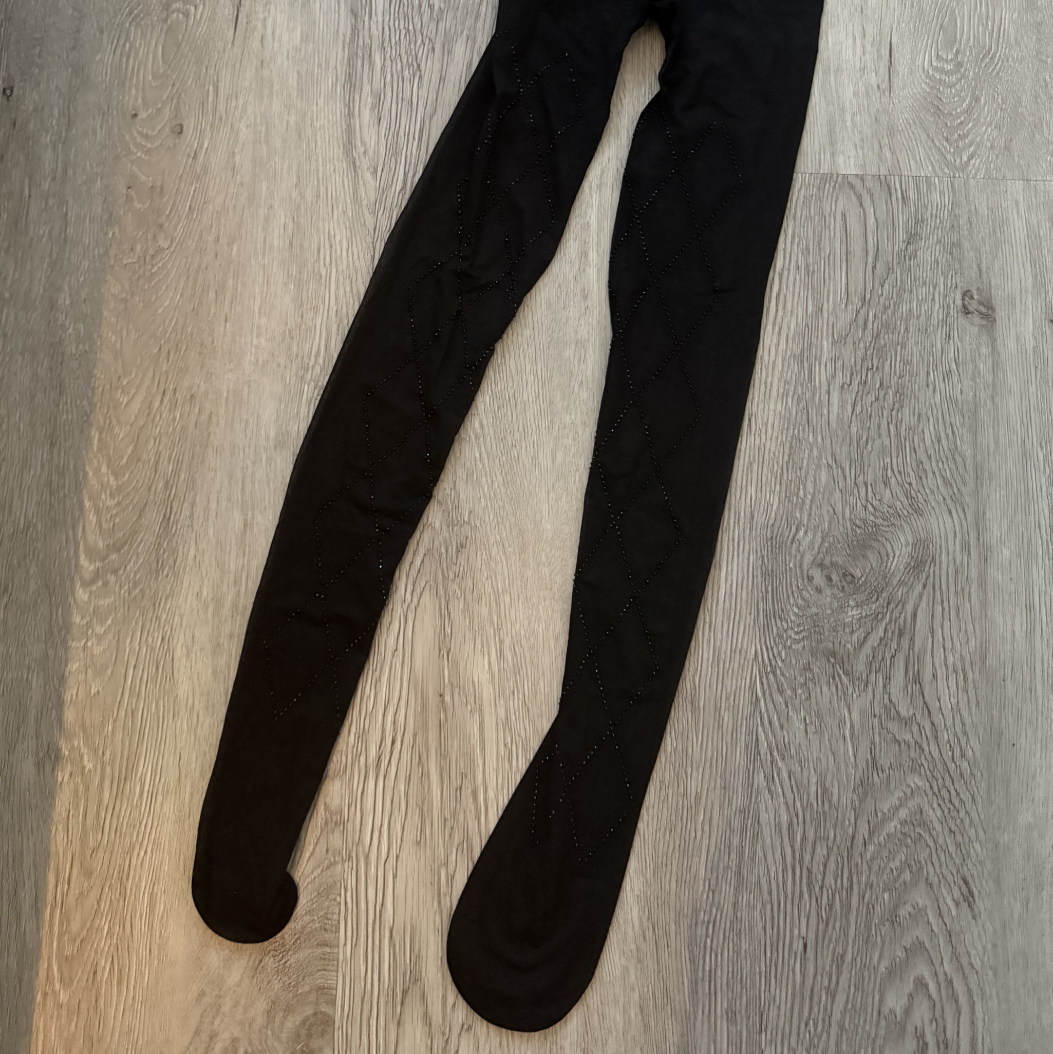 WORN BLACK TIGHTS WITH RINESTONES