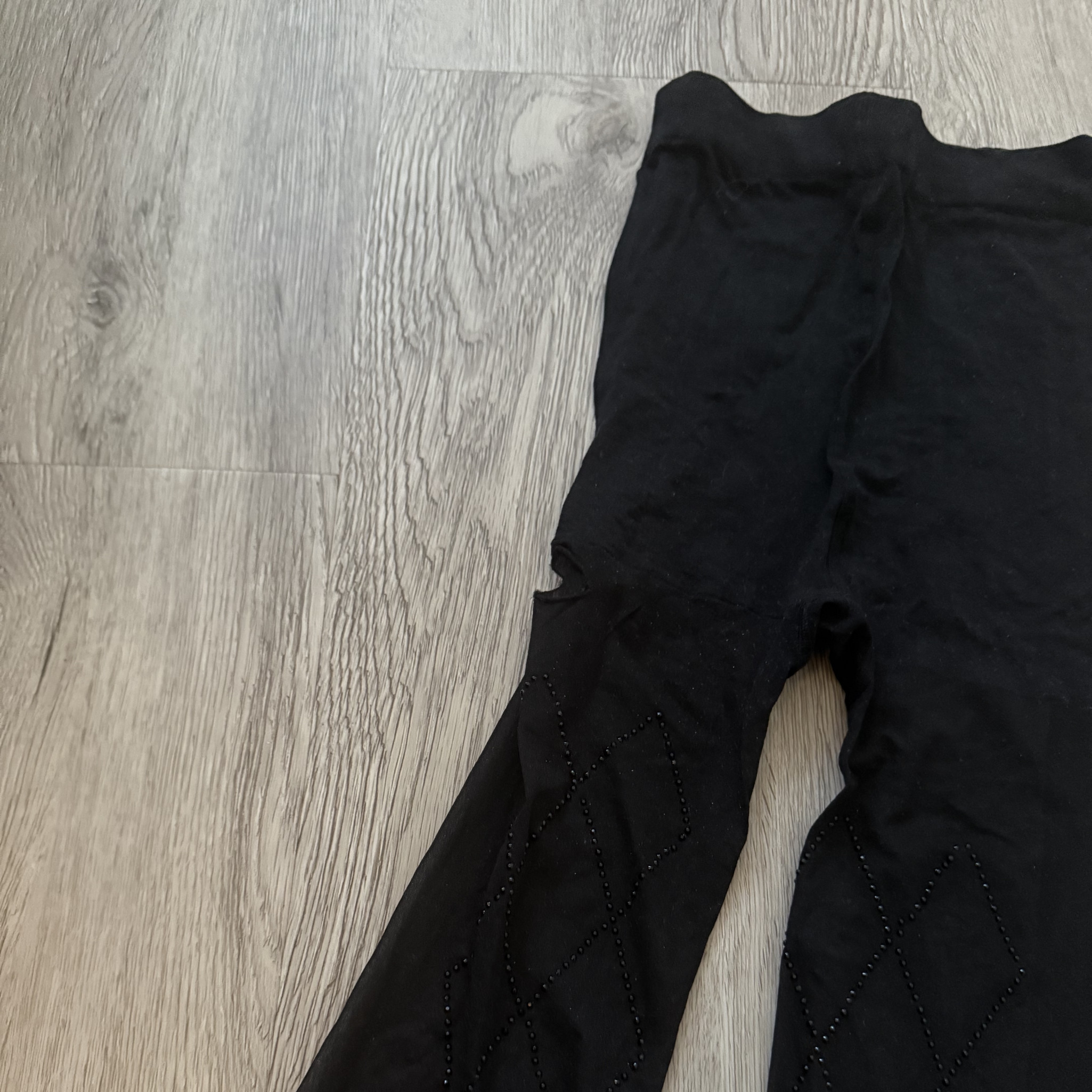 WORN BLACK TIGHTS WITH RINESTONES