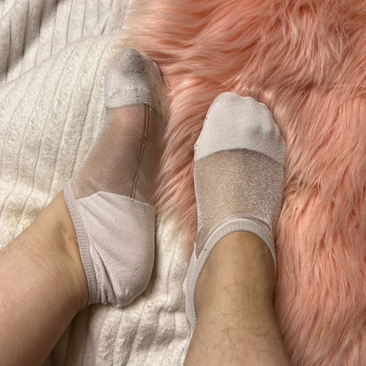 Worn white transparent socks