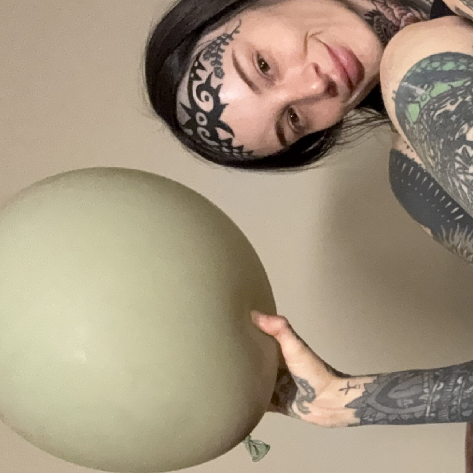 sage colored balloon foot fetish photo set
