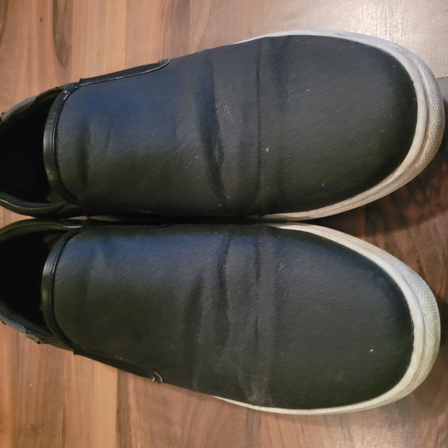 Black Moccasins with white soles