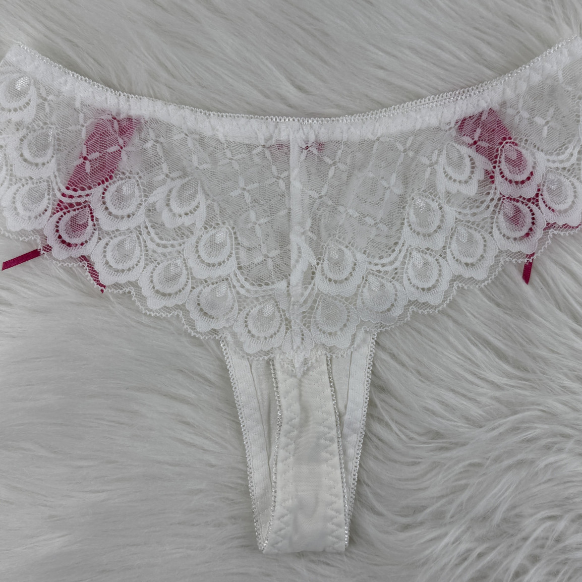 Peacock White Thongs